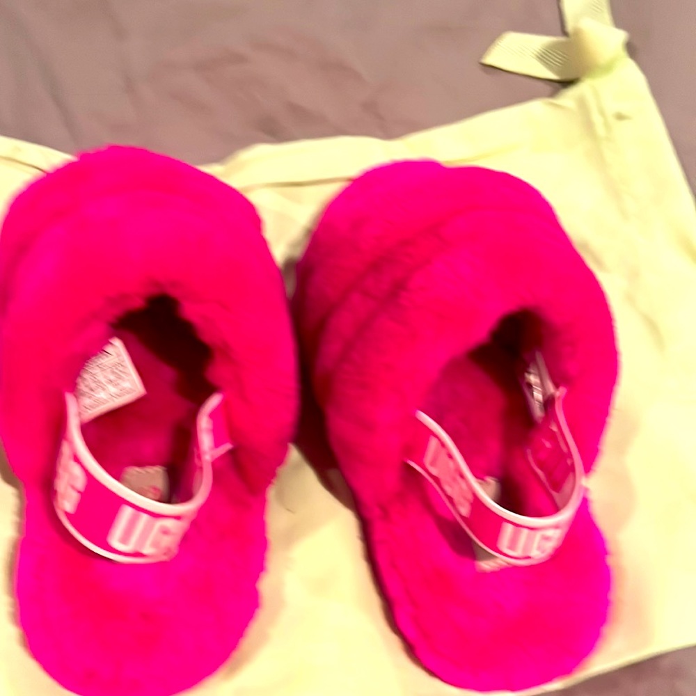 Uggs- kids hot pink fluff yea slipper slides.  Size 13.  Like new.